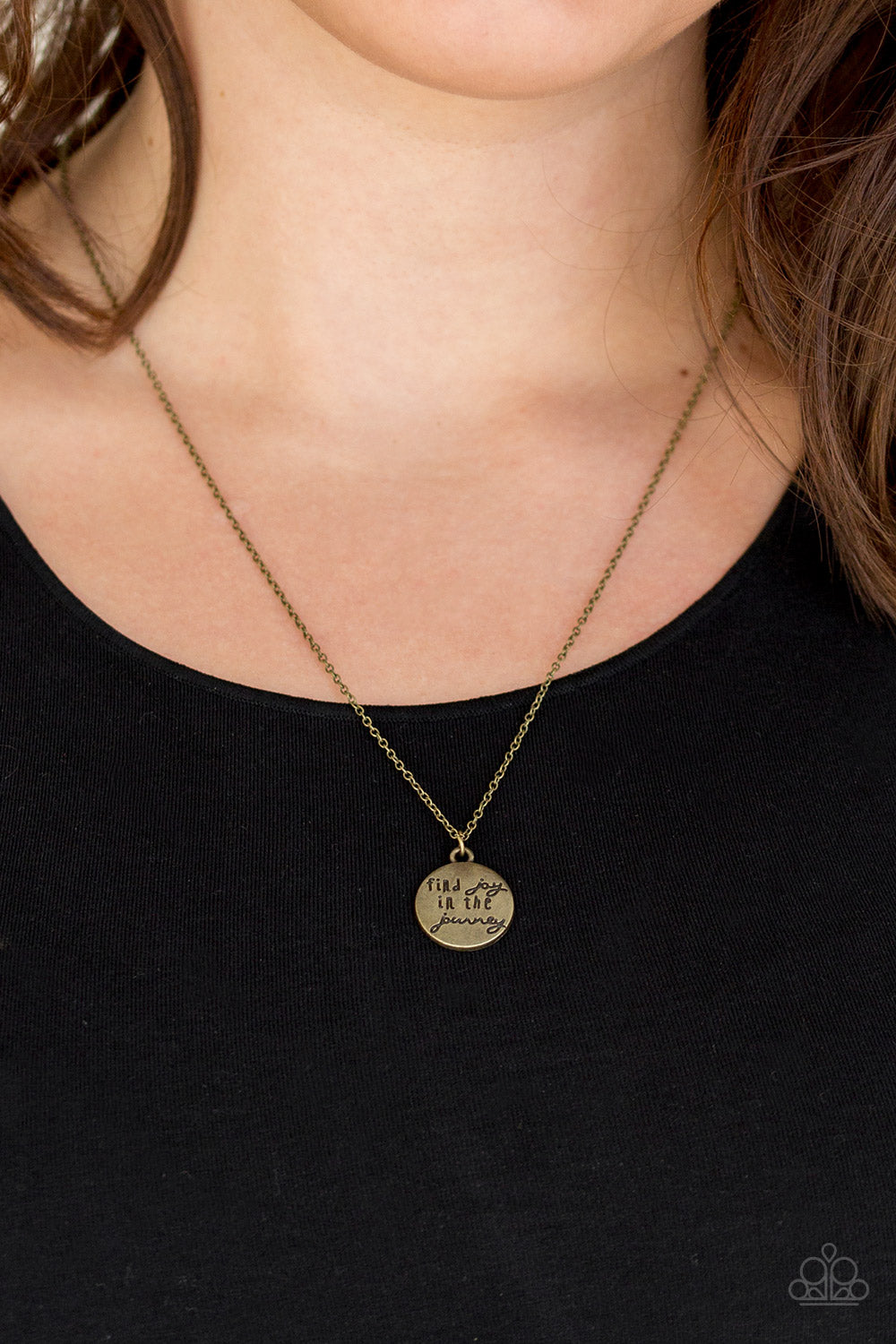 Find Joy - Brass Necklace - Paparazzi Accessories Stamped in the inspirational phrase, "find joy in the journey," a round brass pendant swings below the collar for a seasonal look. Features an adjustable clasp closure.  Sold as one individual necklace. Includes one pair of matching earrings.  New Kit