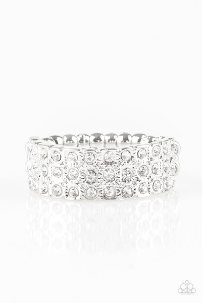 Feeling Fab-YOU-less - White Ring - Paparazzi Accessories  Row after row of dazzling white rhinestones are encrusted along a dainty silver band, creating timeless shimmer. Features a dainty stretchy band for a flexible fit.  Sold as one individual ring.  New Kit