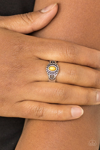 Right On TREK - Yellow Ring - Paparazzi Accessories An earthy yellow bead is pressed into the center of a dainty silver band radiating with tribal inspired textures for a seasonal look. Features a dainty stretchy band for a flexible fit.  Sold as one individual ring.