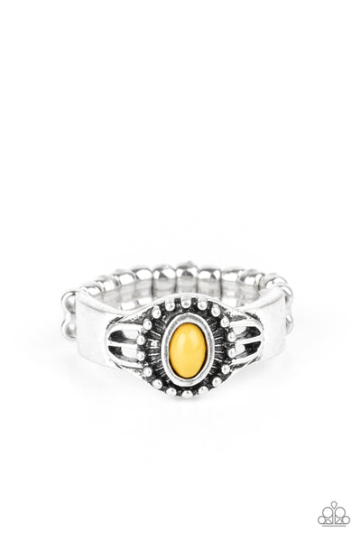 Right On TREK - Yellow Ring - Paparazzi Accessories An earthy yellow bead is pressed into the center of a dainty silver band radiating with tribal inspired textures for a seasonal look. Features a dainty stretchy band for a flexible fit.  Sold as one individual ring.