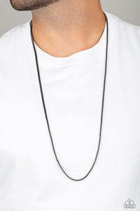 Underground - Black Necklace - Paparazzi Accessories Brushed in a high-sheen finish, a shimmery strand of gunmetal mesh chain drapes across the chest for a sleek look. Features an adjustable clasp closure.  Sold as one individual necklace.