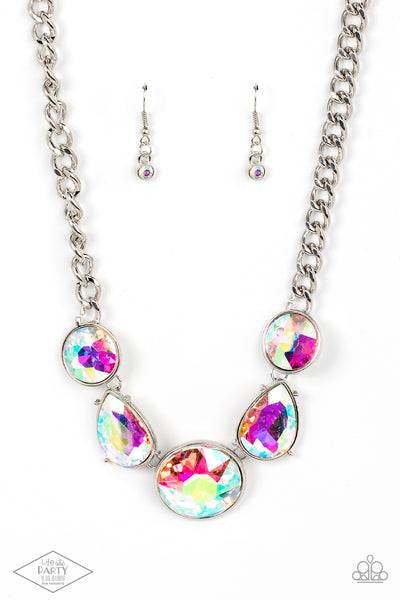 All The Worlds My Stage - Multi Necklace - Paparazzi Accessories Infused with heavy silver chain, an exaggerated display of round and teardrop shaped iridescent rhinestones connects below the collar for a blinding look. Features an adjustable clasp closure.  Sold as one individual necklace. Includes one pair of matching earrings.  New Kit FANFAVORITE This Fan Favorite is back in the spotlight at the request of our 2021 Life of the Party member with Black Diamond Access, Colleen S.