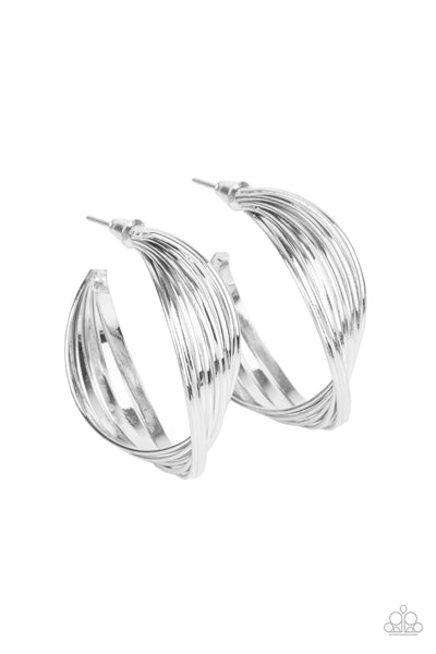 Curves In All The Right Places - Silver Earrings - Paparazzi Accessories A stack of shiny silver hoops delicately twists at the center, creating a curvaceous display. Earring attaches to a standard post fitting. Hoop measures approximately 1 1/4" in diameter.  Sold as one pair of hoop earrings.  New Kit