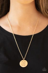 Light It Up - Gold Necklace - Paparazzi Accessories A glistening gold disc is stamped in the inspiring phrase, "Let your light shine," at the bottom of a shiny gold chain. Features an adjustable clasp closure.  Sold as one individual necklace. Includes one pair of matching earrings.  New Kit