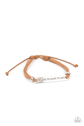 To Live, To Learn, To Love - Brown Bracelet - Paparazzi Accessories Infused with pairs of silver rings, a silver plate stamped in the phrase, "To Live, To Learn, To Love," is knotted in place around the wrist by brown suede bands for an inspirational look. Features an adjustable sliding knot closure.  Sold as one individual bracelet.  New Kit