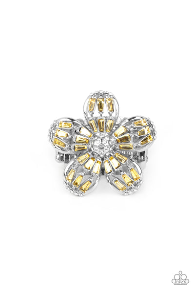 Botanical Ballroom - Yellow Ring - Paparazzi Accessories Yellow emerald-style rhinestones adorn the silver petals of a blooming flower featuring a white rhinestone encrusted beaded center. The tips of the colorful petals are dusted in dainty white rhinestones, adding extra shimmer to the sparkly centerpiece. Features a stretchy band for a flexible fit.  Sold as one individual ring.  New Kit