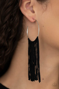 Flauntable Fringe - Black Hoop Earrings - Paparazzi Accessories A curtain of black cords stream from the center of a dainty silver hoop, creating a glamorous fringe. Earring attaches to a standard post fitting. Hoop measures approximately 1 3/4" in diameter.  Sold as one pair of hoop earrings.  New Kit