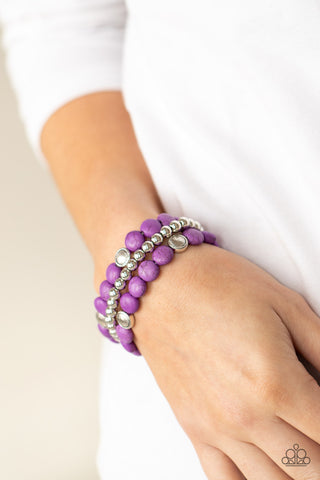 Desert Verbena - Purple Bracelet - Paparazzi Accessories A vivacious collection of purple stone beads, ornate silver accents, and classic silver beads are threaded along stretchy bands around the wrist for a seasonally layered look.  Sold as one set of three bracelets.  New Kit