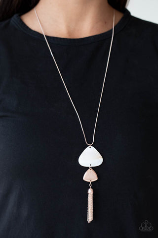 TIDE You Over - Rose Gold Necklace - Paparazzi Accessories A dainty rose gold tassel sways from the bottom of two triangular discs, one white shell-like and one rose gold, for a flirty pendant at the end of a lengthened rose gold snake chain. Features an adjustable clasp closure.  Sold as one individual necklace. Includes one pair of matching earrings.  New Kit