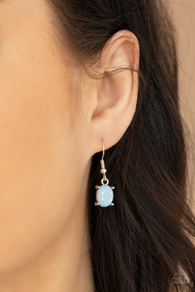 Ethereal Romance - Blue Earrings - Paparazzi Accessories Varying in opacity and shape, mismatched Cerulean beads attach to oversized white rhinestones, creating bubbly frames that delicately link into an ethereal display below the collar. Features an adjustable clasp closure.  Sold as one individual necklace. Includes one pair of matching earrings.  New Kit