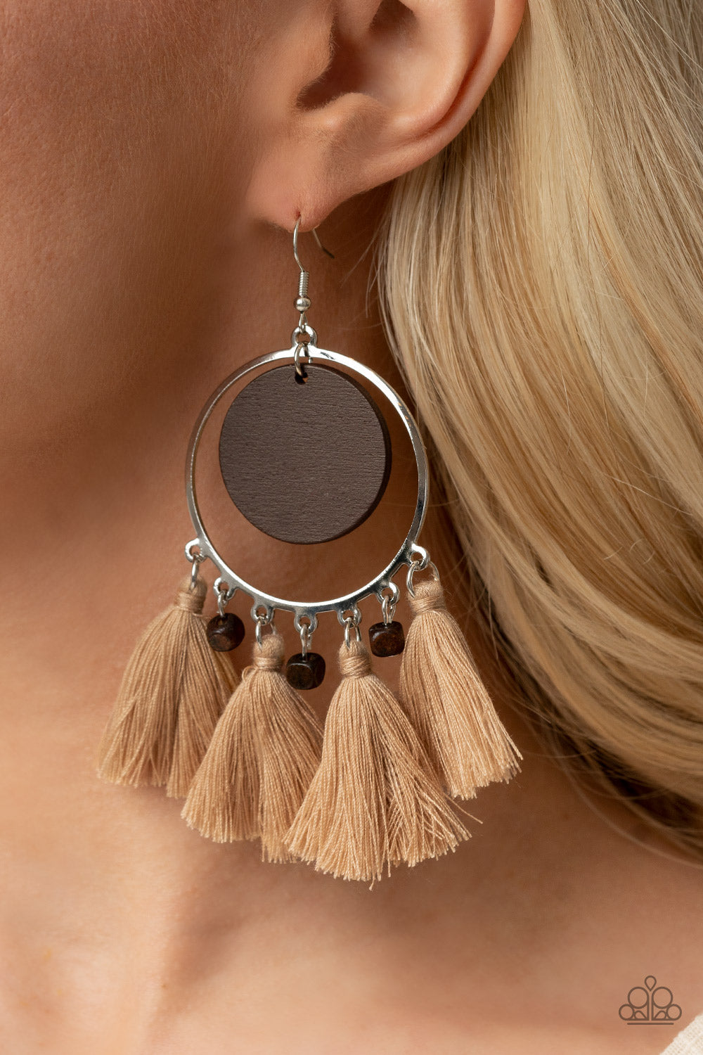 Yacht Bait - Brown Earrings - Paparazzi Accessories A wooden disc swings from the top of a shiny silver hoop that is adorned in dainty wooden cube beads and Desert Mist threaded tassels, creating an earthy fringe. Earring attaches to a standard fishhook fitting.  Sold as one pair of earrings.  New Kit