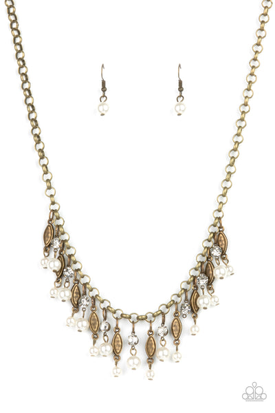 Cosmopolitan Couture - Brass Necklace - Paparazzi Accessories Bubbly white pearls swing from the bottoms of glittery white rhinestones and studded brass frames that alternate along a chunky brass chain creating a glamorously grunge fringe below the collar. Features an adjustable clasp closure.  Sold as one individual necklace. Includes one pair of matching earrings.  New Kit