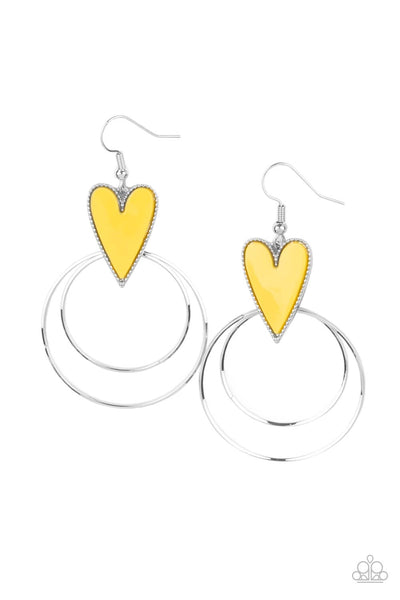 Happily Ever Hearts - Yellow Earrings - Paparazzi Accessories Dainty silver hoops attach to the bottom of a playful Illuminating heart frame, creating a flirtatious pop of color. Earring attaches to a standard fishhook fitting.  Sold as one pair of earrings.  New Kit