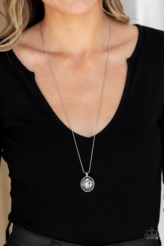 Instant Icon - Silver Necklace - Paparazzi Accessories An oversized smoky gem is pressed into the center of a sleek silver fitting, creating a mesmerizing statement piece at the bottom of a sleek silver chain. Features an adjustable clasp closure.  Sold as one individual necklace. Includes one pair of matching earrings.  New Kit