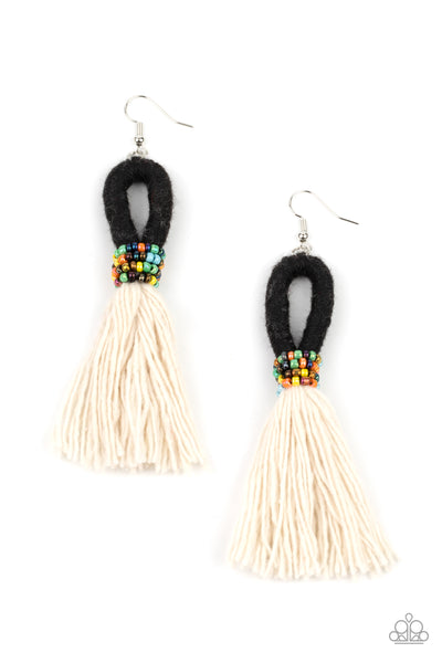 The Dustup - Black Earrings - Paparazzi Accessories A tassel of soft white cotton fans out under rows of brightly colored seed beads. Anchored by a loop of jet black floss, the eye-catching style swings from the ear for a show-stopping statement. Earring attaches to a standard fishhook fitting.  Sold as one pair of earrings.  New Kit