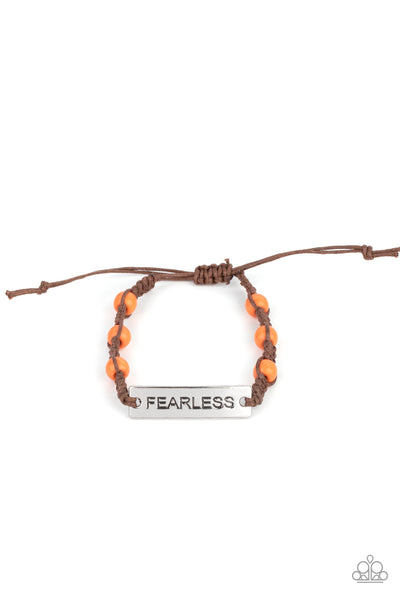 Conversation Piece - Orange Bracelet - Paparazzi Accessories A silver plate engraved with the word "FEARLESS" is centered between brown knotted cording. Accented with bright orange stone beads, it slides around the wrist for an unconventional conversation starter. Features an adjustable sliding knot closure.  Sold as one individual bracelet.  New Kit