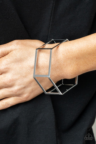 Gen HEX - Silver Bracelet - Paparazzi Accessories A row of airy silver rectangular frames delicately bend into a hexagonal cuff, creating an edgy centerpiece.  Sold as one individual bracelet.  New Kit