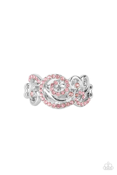 Melodic Motion - Pink Ring - Paparazzi Accessories An ornamental silver scrollwork frame, adorned with dainty sparkling pink rhinestones travels across the finger in a melodic display. Features a dainty stretchy band for a flexible fit.  Sold as one individual ring.  New Kit