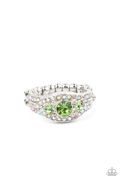 Celestial Crowns - Green Ring - Paparazzi Accessories A trio of brilliant green rhinestones is set inside a glittering rhinestone-encrusted frame creating a divinely heavenly essence atop the finger. Features a dainty stretchy band for a flexible fit.  Sold as one individual ring.  New Kit