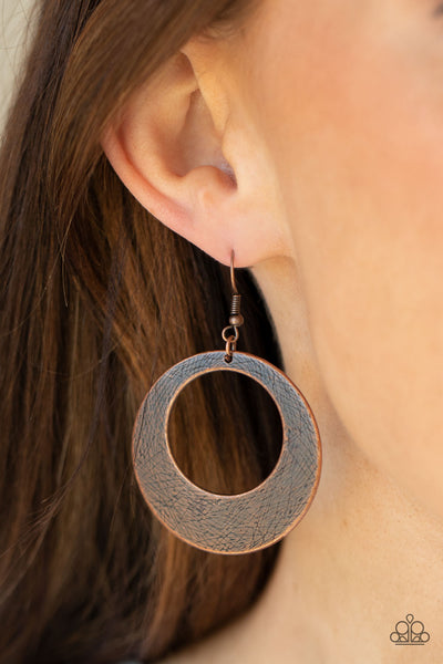 Outer Plains - Copper Earrings - Paparazzi Accessories Brushed in an antiqued shimmer, a round copper frame is scratched in a gritty linear pattern for a rustic fashion. Earring attaches to a standard fishhook fitting.  Sold as one pair of earrings.