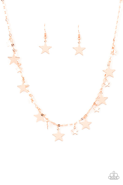 Starry Shindig - Copper Necklace  - Paparazzi Accessories Varying in size, dainty shiny copper stars alternate along a decorative shiny copper chain, creating a stellar fringe below the collar. Features an adjustable clasp closure.  Sold as one individual necklace. Includes one pair of matching earrings.  New Kit