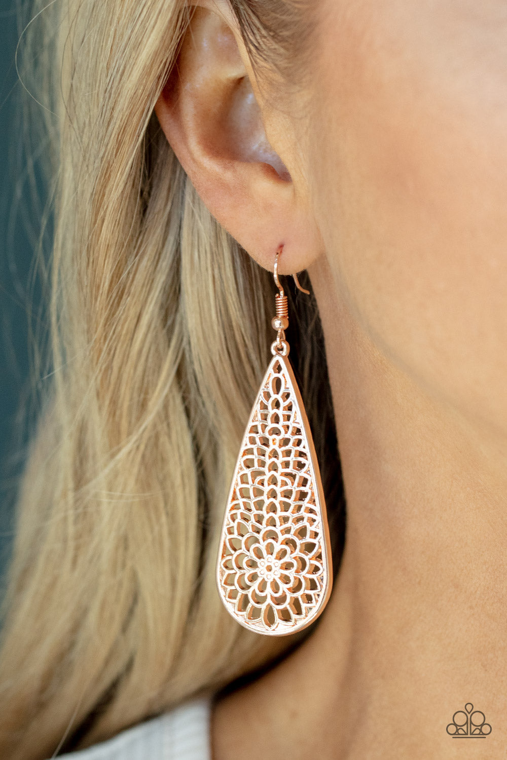 Posy Pasture - Rose Gold Earrings - Paparazzi Accessories A mesmerizing explosion of shiny rose gold filigree petals bursts inside an oversized teardrop frame creating a dreamy nature inspired lure. Earring attaches to a standard fishhook fitting.  Sold as one pair of earrings.