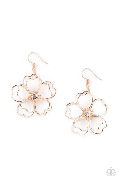 Petal Power - Rose Gold Earrings - Paparazzi Accessories Layers of heart-shaped petals molded from shiny rose gold wire create an airy three-dimensional flower. A dainty white rhinestone dots the center adding sparkle to the whimsical frame. Earring attaches to a standard fishhook fitting.  Sold as one pair of earrings.  New Kit