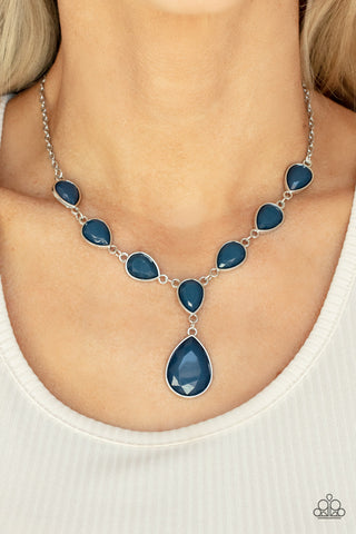 Party Paradise - Blue Necklace - Paparazzi Accessories Encased in sleek silver fittings, a chain of faceted blue teardrops gives way to an oversized blue teardrop pendant for an enchanting pop of color below the collar. Features an adjustable clasp closure.  Sold as one individual necklace. Includes one pair of matching earrings.  New Kit