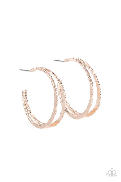 Rustic Curves - Rose Gold Hoop Earrings - Paparazzi Accessories Featuring textured edges, two rose gold crescent frames delicately curve into a bold double hoop for an edgy urban look. Earring attaches to a standard post fitting. Hoop measures approximately 1 1/2" in diameter.  Sold as one pair of hoop earrings.  New Kit