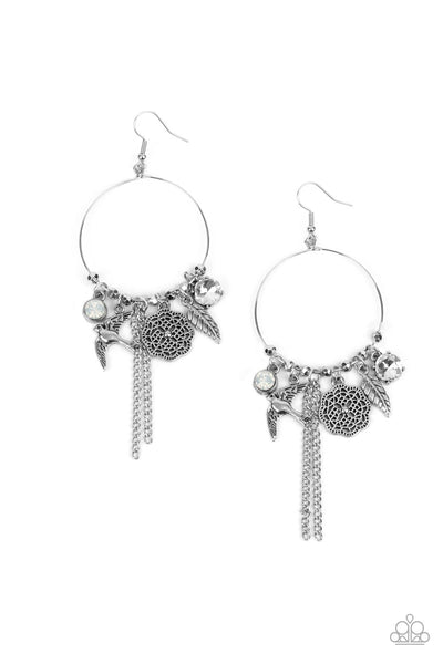 TWEET Dreams - White Earrings - Paparazzi Accessories Free-spirited charms, including opal and white gems, a floral medallion, a bird in flight, and a fluttering feather, dangle from a dainty silver ring coalescing into a charming lure. Earring attaches to a standard fishhook fitting.  Sold as one pair of earrings.  New Kit