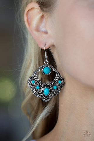 Saguaro Sunset - Blue Earrings - Paparazzi Accessories An earthy assortment of oval and round turquoise stones adorn the front of a scalloped silver frame that is studded and engraved in tribal inspired details. Earring attaches to a standard fishhook fitting.  Sold as one pair of earrings.  New Kit