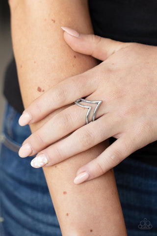 Adventurously Angled - Silver Ring - Paparazzi Accessories Two dainty silver bars sharply arc across the finger, coalescing into an airy frame. Features a dainty stretchy band for a flexible fit.  Sold as one individual ring.  New Kit