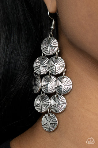 How CHIME Flies - Silver Earrings - Paparazzi Accessories Etched in linear textures, star stamped silver discs cascade from a netted backdrop, creating a noisemaking lure. Earring attaches to a standard fishhook fitting.  Sold as one pair of earrings.