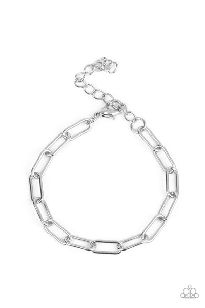 Tailgate Party - Silver Bracelet - Paparazzi Accessories An oversized collection of silver oblong links interlock around the wrist for a casual hint of shimmer. Features an adjustable clasp closure.  Sold as one individual bracelet.  New Kit