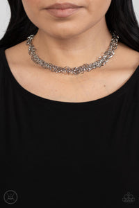 Cause a Commotion - Silver Choker Necklace - Paparazzi Accessories A shiny series of flat and beveled silver hoops delicately cluster along a dainty silver chain around the neck, creating a tinkling fringe. Features an adjustable clasp closure.  Sold as one individual choker necklace. Includes one pair of matching earrings.  New Kit Choker