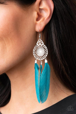 Pretty in PLUMES - Blue Earrings - Paparazzi Accessories Three Mykonos Blue feathers swing from the bottom of a dizzying silver frame featuring airy filigree detail, resulting in a flirtatiously colorful fringe. Earring attaches to a standard fishhook fitting.  Sold as one pair of earrings.  New Kit