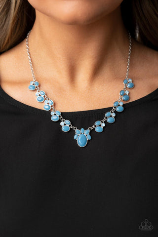 Fairytale Forte - Blue Necklace - Paparazzi Accessories Delicately encased in shiny silver fittings, bubbly clusters of Spring Lake beads and glittery blue rhinestones elegantly link below the collar, resulting in an enchanting centerpiece. Features an adjustable clasp closure.  Sold as one individual necklace. Includes one pair of matching earrings.  New Kit