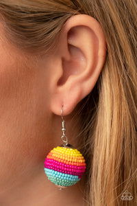 Zest Fest - Multi Earrings - Paparazzi Accessories Strands of multicolored seed beads decoratively spin around a spherical frame, resulting in a colorful 3-dimensional display. Earring attaches to a standard fishhook fitting.  Sold as one pair of earrings.  New Kit