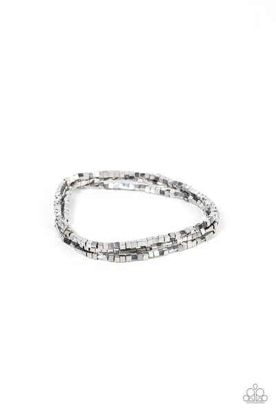 Block Bash - Silver Stretch Bracelets - Paparazzi Accessories A dainty collection of silver cube beads alternates along stretchy bands, stacking into edgy layers around the wrist.  Sold as one set of three bracelets.