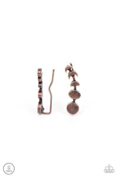 Its Just a Phase - Copper Ear Crawler Earrings - Paparazzi Accessories A dainty copper bar displays the phases of the moon as it curls across the ear for a stellar look. Features an extended post fitting that climbs the back of the ear and can be pressed together for a more secure fit.  Sold as one pair of ear crawlers.  New Kit