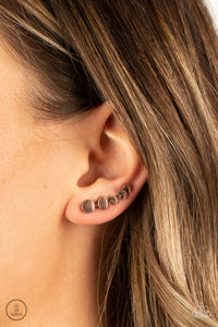 Its Just a Phase - Copper Ear Crawler Earrings - Paparazzi Accessories A dainty copper bar displays the phases of the moon as it curls across the ear for a stellar look. Features an extended post fitting that climbs the back of the ear and can be pressed together for a more secure fit.  Sold as one pair of ear crawlers.  New Kit