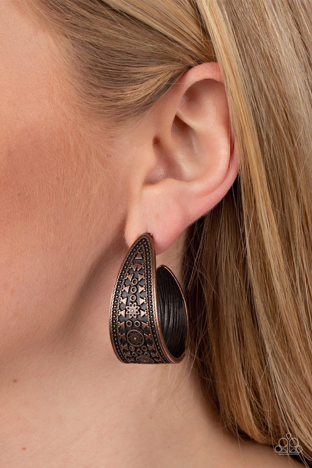 Marketplace Mixer - Copper Hoop Earrings - Paparazzi Accessories Embossed in textile inspired patterns, a rustic copper ribbon sharply curves into a textured hoop for an adventurous finish. Earring attaches to a standard post fitting. Hoop measures approximately 1" in diameter.  Sold as one pair of hoop earrings.  New Kit