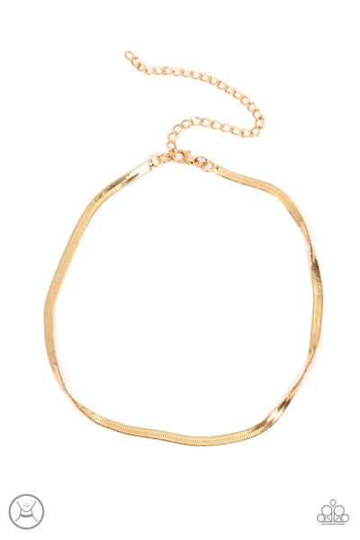 In No Time Flat - Gold Choker Necklace - Paparazzi Accessories A strand of glistening gold snake chain loops around the neck, resulting in an edgy shimmer. Features an adjustable clasp closure.  Sold as one individual choker necklace. Includes one pair of matching earrings.  New Kit Choker